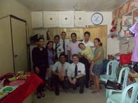 Elder Crocker and missionaries serving Jesus Christ visit family